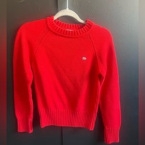 Red Lacoste sweater. Good condition all items dry cleaned.